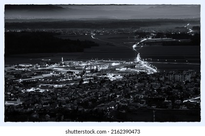 Night town, city, cityscape with streets and lights.