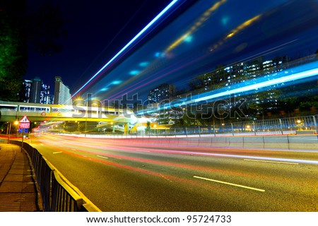 Similar – Bus and traffic light, black and white shot with motion blur