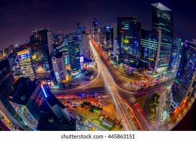 Night traffic on a major interstection at night in Seoul, South Korea.