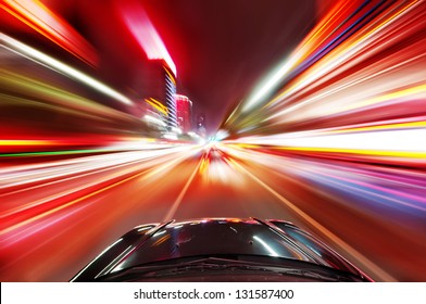 Night Traffic,shoot From The Window Of Rush Car,motion Blur Steet Light.