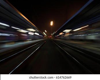 Night train station with parallel lights paths speed

