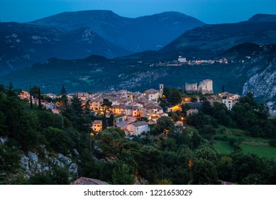 Night View From Above To An Old Medieval French Village. Greolieres Is A Medieval Small Town With Two Castles, Narrow Streets Lined With Typical Houses Of The Provencal Mountain.