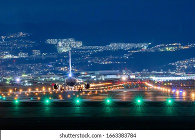 Night View Of The Airport And Aircraft