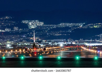 Night View Of The Airport And Aircraft