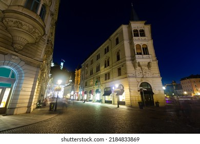 Night view of ancient building of Philip Mansion at corner of Cankar Embankment and Stritar Street marking entry into Ljubljana town medieval part, Slovenia