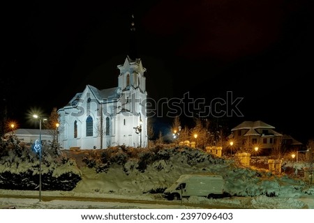 Night view of the chapel of St. Crosses in Pelhřimov, snow, winter

