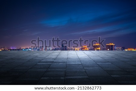 Photo of Night view of the city in front of the square