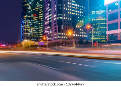 The Night View Of The City Road And The Fuzzy Car Lights In Luji