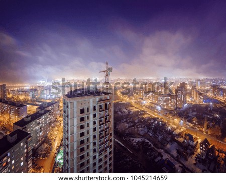 Night view of the city of Ufa from the roof of new buildings.