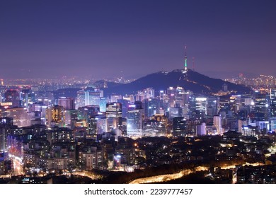 Night view of downtown Seoul skyline from the top of a hill, South Korea - Powered by Shutterstock