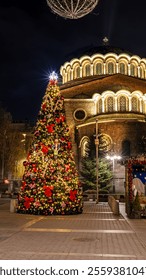 Night view in downtown Sofia Metropolitan Cathedral St. Great Martyr Nedelya, the scene of Christmas and Relics of St. King Stefan Milutin with Christmas decorations. Bulgaria