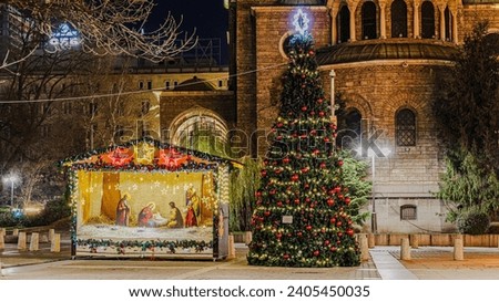 Night view in downtown Sofia Metropolitan Cathedral St. Great Martyr Nedelya, the scene of Christmas and Relics of St. King Stefan Milutin with Christmas decorations. Bulgaria
