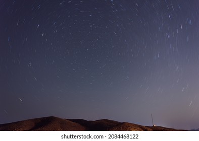 Night View From A Hill In Desert With Star Trails And North Star At Frame In Iran