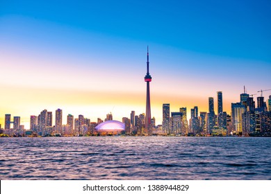 Night View Of Iconic Landmarks And Buildings Of Toronto City Skyline From Centre Island, Canada