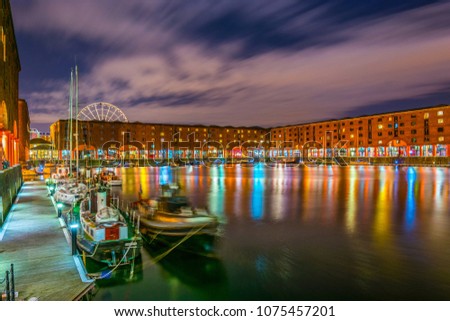 Night view of illuminated albert dock in Liverpool, England
