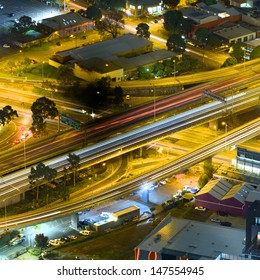 Night View Of Melbourne City Streets Showing Freeway Flyover And Buildings 