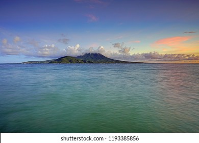 Night view of the Nevis Peak volcano across the Caribbean Sea from St Kitts
