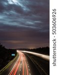 Night View on M5, transportation on motorway in England, light motion blur