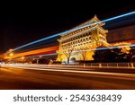 The night view of the Qianmen Street in Beijing, Ancient architecture in Beijing, China，Night view of the archery Tower at Zhengyangmen in Beijing
