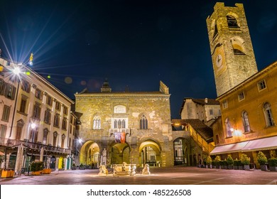 night view of the ragione palace and torre civica in Bergamo, Italy