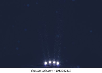 Night view with rays of light