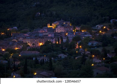 Night View Of Seillans, Atmospherically Lit French Village On A Hillside