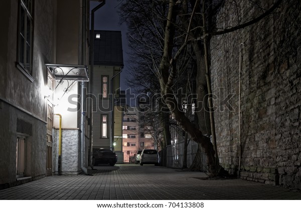 Night\
view of a sheltered yard at Tallinn, Estonia. There are a lot of\
yards like this right in the middle of the\
city.