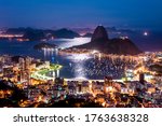 Night View of Sugarloaf Mountain and Botafogo in Rio de Janeiro With Moonlight Reflecting on Water