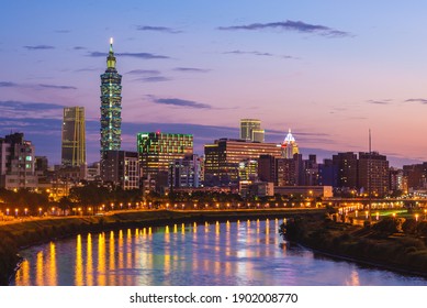 night view of taipei city with taipei 101 tower by the river in taiwan