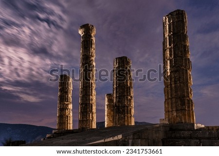 Night view of Temple of Apollo at Delphi in Greece. Famous touristic destination.