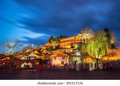 Night view of traditional Chinese wooden building in the Old Town of Lijiang, Yunnan province, China. The Old Town of Lijiang is a popular tourist destination of Asia. - Powered by Shutterstock