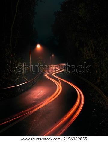A night view of a traffic road with long exposure lights