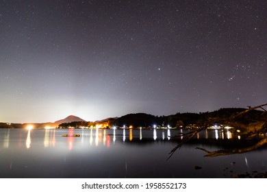 Night view and water surface reflection