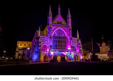 A Night View Of Winchester Cathedral, Hampshire, During Christmas Time, UK