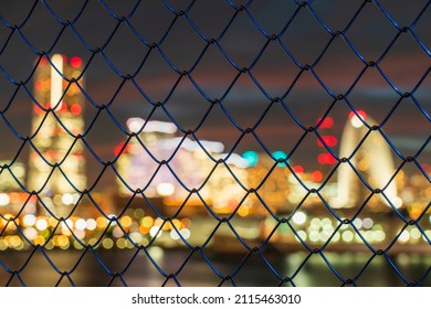Night view of Yokohama Minato Mirai through the fence
