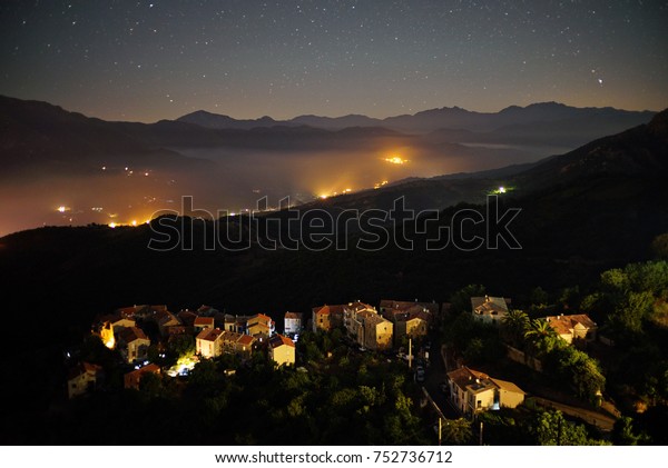 night village\
in Corsica, view from the\
mountains