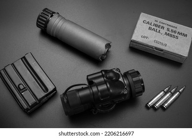 Night Vision Device And Silencer From A Rifle.