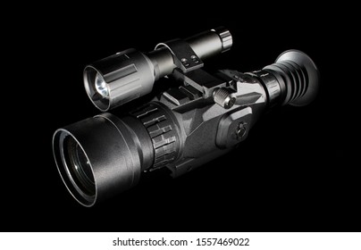 Night Vision Rifle Scope On A Black Background