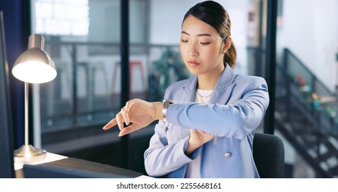 Night, watch and late with a business asian woman at work for overtime on a deadline in her office. Computer, target and report with a female employee working on a desktop alone in the workplace - Shutterstock ID 2255668161