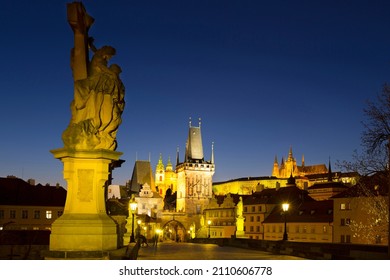 Night winter Prague Lesser Town with the gothic Castle from Charles Bridge above the River Vltava, Czech Republic - Shutterstock ID 2110606778