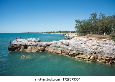 Nightcliff, NT/Australia-April 25,2018: People Fishing Off The Rocky Cliffs In Nightcliff In The Northern Territory Of Australia