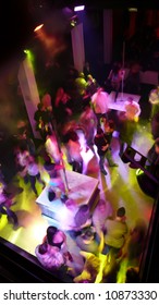 Nightclub Dancefloor Scene With Dancing Crowd In Motion