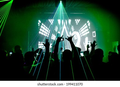 Nightclub Man With Mobile Phone Recording Lasers At Party Rave Silhouette