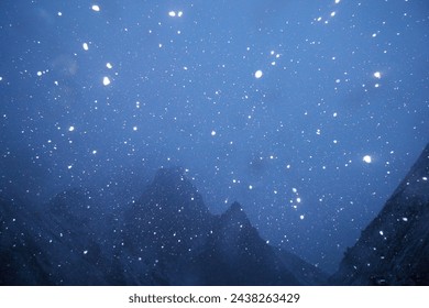 Nightfall Serenity: A Mesmerizing Symphony of Snowfall in the Himalayas - Behold Nature's Graceful Dance Under the Starlit Sky, Captured in the Quietude of the Night - Powered by Shutterstock