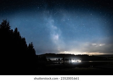 Nightime  next to a lake - Shutterstock ID 2352001661