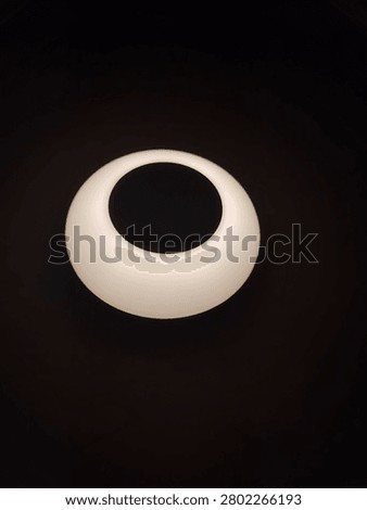 The nightlight emitted a soft light.