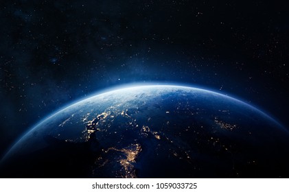 Nightly Earth in the outer space. Abstract wallpaper. City lights on planet. Civilization. Elements of this image furnished by NASA