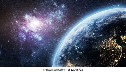 Nightly Planet Earth In The Outer Space. Nebula. Abstract Wallpaper. View From Space Station. City Lights On Planet. Civilization. Elements Of This Image Furnished By NASA