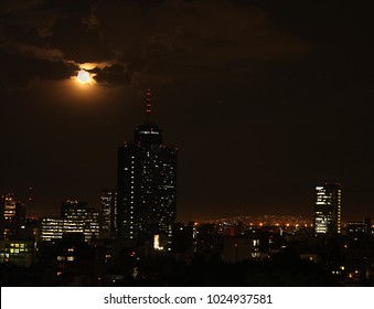 Nights in the city of mexico and blue blood moon phenomenon alone every hundred and fifty years