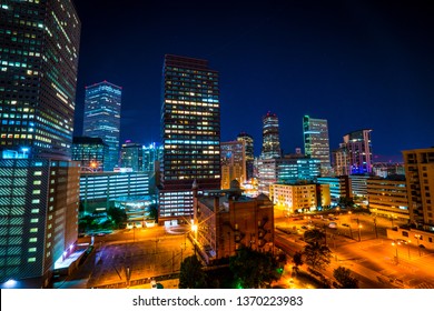 Nightscape Time Lapse Of Denver Colorado Skyline Cityscape With Illuminated City Lights From Skyscrapers And Downtown Night Life